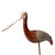Hand-carved and painted curlew shorebird decoy dating to circa 1980. Carved from burl wood and mounted on a driftwood...