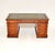 A very smart and well made antique Victorian Walnut leather top pedestal desk. This was made in England, it dates from...