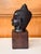 Bronze fragment of a Buddha head in classic U-Thong style on a wood display stand circa 13-15th century from Central...