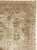 This mid-20th-century Persian Tabriz carpet presents an elegant allover floral composition across a warm ivory field....