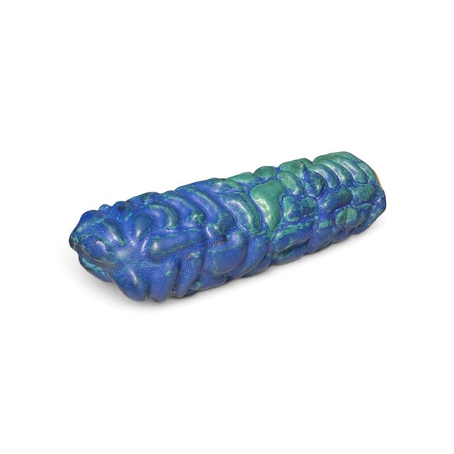 A playful biomorphic vintage studio pottery sculpture in shades of blue and green. Signed by the artist