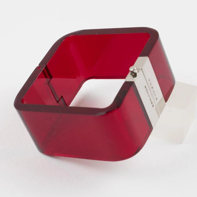 This gorgeous, original Bottega Veneta Italy clamper bangle bracelet boasts a chunky square shape with transparent magenta...