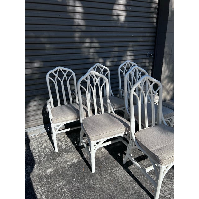 Bring timeless coastal charm to your dining space with this beautiful set of six vintage dining chairs. Crafted in classic...