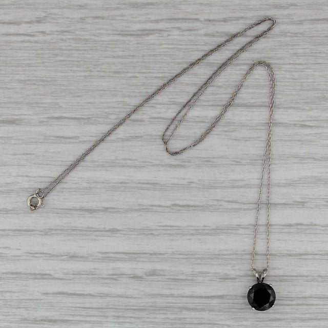 Gemstone Information: - Natural Diamond - Carats - 1.80ct Cut - Round Brilliant Color - Treated Black Please note there...