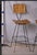 Add timeless Mid-Century Modern style to your space with this striking pair of vintage bar chairs. Designed in the iconic...