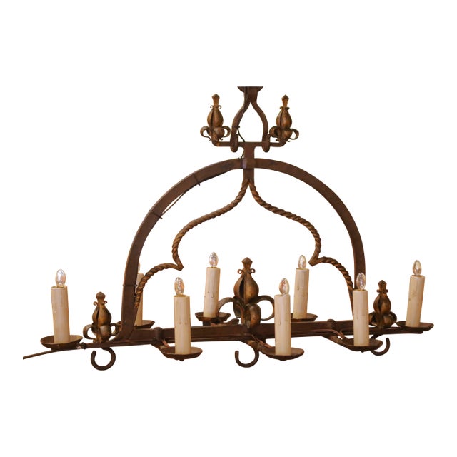 19th Century French Gothic Wrought Iron Eight-Light Chandelier With Gilt Accents For Sale
