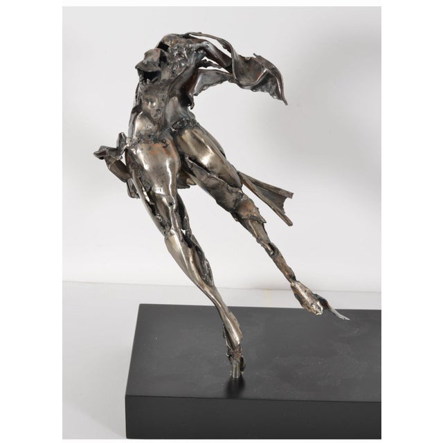 Judith Brown, American "Reveler" Steel sculpture of a body in motion, dancer Signed with initials Initialed "JB" Base: 11"...