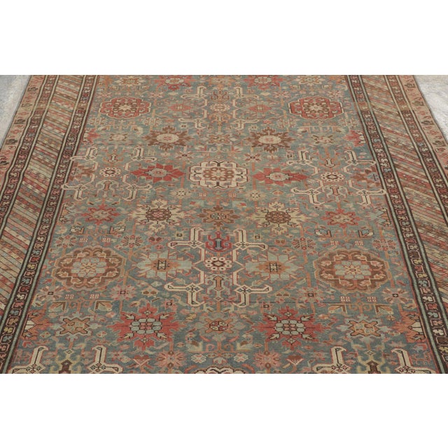 This 6x7 antique Caucasian Kuba rug is a finely woven wool piece from Azerbaijan dating to circa 1890–1900. The rug...