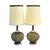 An impressive pair of oversized table lamps featuring spherical globes constructed from layered strands of spun lucite in...