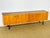 Magnificent vintage Scandinavian teak sideboard dating from the 1960s, featuring four storage doors with shelves. The...