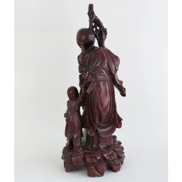 Impressive hand carved boxwood representation of the Chinese god of longevity, Shoulao. From the turn of the 20th century,...