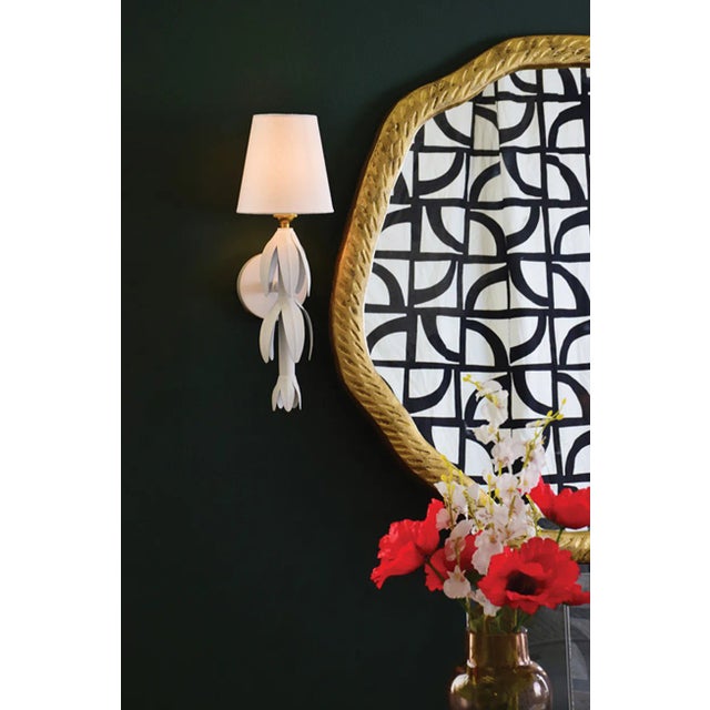 The textured framed Cadence Mirror is distinctively organic in shape. This mirror works well in coastal or modern spaces....