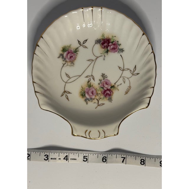 Antique Royal Bayreuth floral dish with hand-painted roses and gold trim—classic European elegance. Delicate and refined,...
