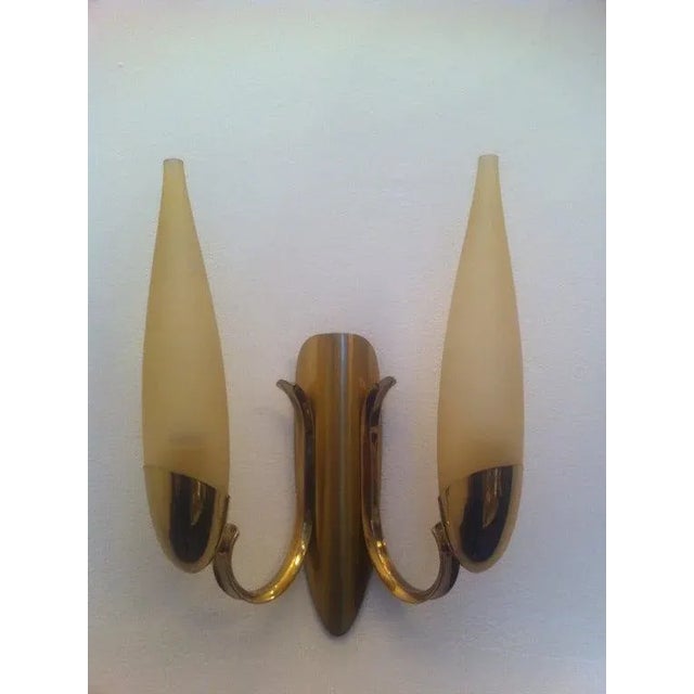 A great pair of Austrian, 1970s brass and golden glass wall lights. Matching chandelier available.
