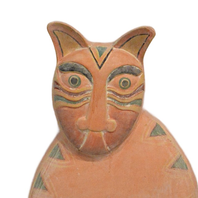 Elevate your collection with this magnificent 30.5-inch hand-carved solid wood sculpture by the celebrated American artist...