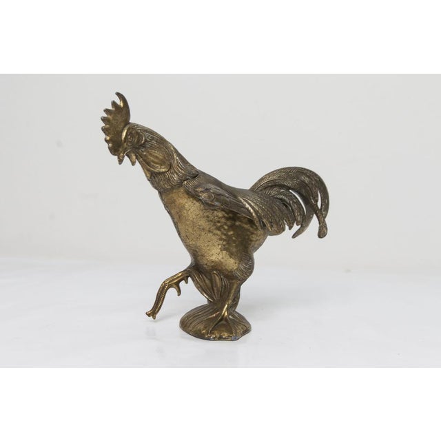 A 1960s spelter rooster ashtray, signed FC on the base. It is very sturdy and in excellent condition, with a hinged back.
