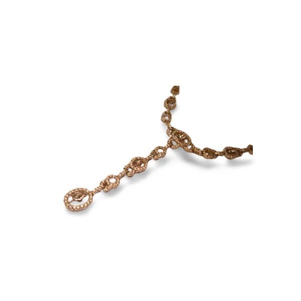 This diamond lariat station necklace is crafted in 18K white gold and features 11 rose cut diamonds along with numerous...