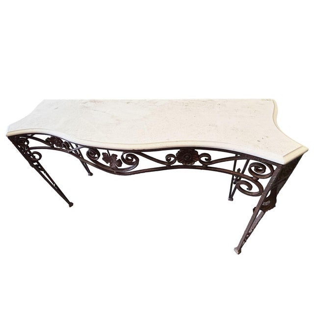 Late 20th Century Neo-gothic cast Iron Console with a Carrara Marble Top with special rounded edges. The Monochromatic...