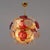 An elegant contemporary sputnik chandelier, handcrafted with a polished brass frame and a rich composition of textured...