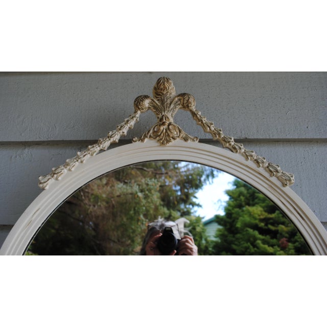 Original condition and beautiful! This wood framed mirror is from 1947, it has its original white paint with gold accents....