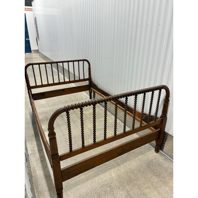 Beautiful late 19th century Jenny Lind spool-turned bed with headboard, footboard, matching side rails and slats, a...