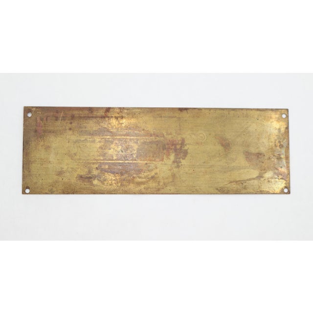 Vintage brass vehicle identification or weight specification plate. It features three blank fields with the "LB" (pounds)...