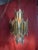 Mid-Century brutal style chandelier swag pendant light made from two layers of aged torch cut brass. This Chandelier...