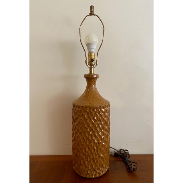 Beautiful authentic David Cressey table lamp. This ochre pebble lamp was designed for Earthgender the David Cressey and...
