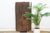 From the Nupe people of central Nigeria's Niger River region, this door is built from five narrow vertical planks, each...
