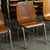 Marvelous vintage Modern chairs composed of walnut molded plywood frames, bent metal square tube bases and hardware,...