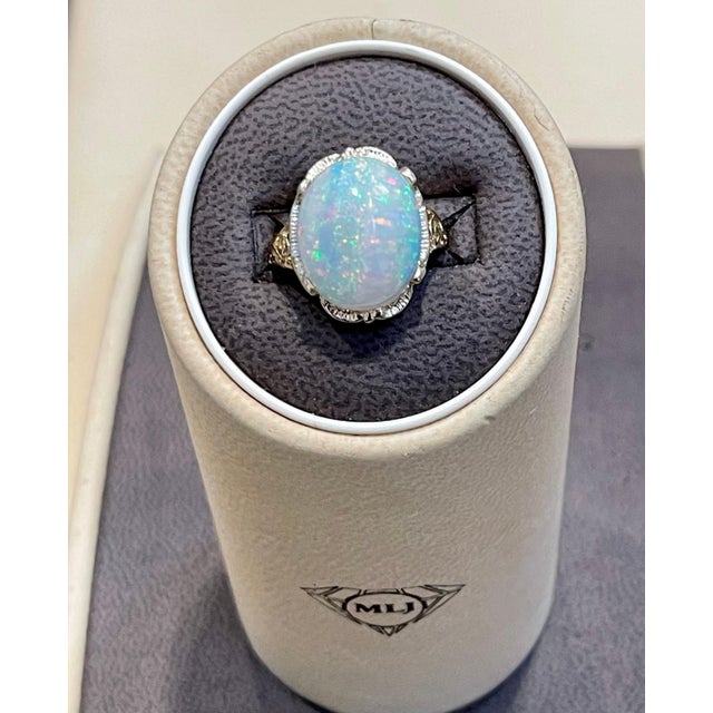 9 Carat Oval Shape Ethiopian Opal Cocktail Ring 14 Karat Yellow Gold For Sale - Image 13 of 18