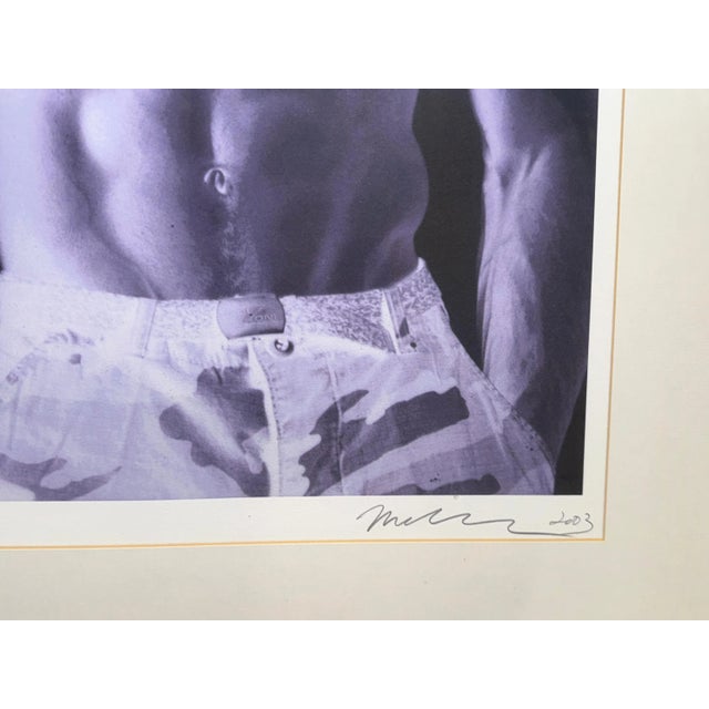 A 2003 print by the renown photographer and visual artist Christopher Makos. It depicts two images, one of Andy Warhol...