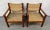 An exceptional pair of Mid-Century Danish chairs that beautifully combines sculptural design with innovative...