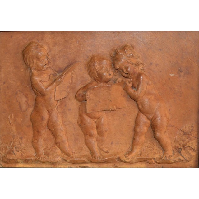 A rare carving by Luigi Frullini depicting 3 young figures reading. Very fine detail done in virtuoso technique. Signed...