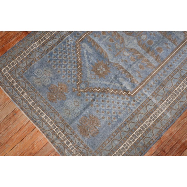 Mid 20th Century Turkish Anatolian tribal rug in blues and browns