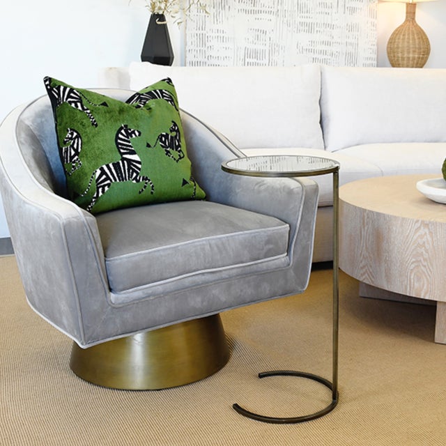 Our round, cigar table cozies up perfectly next to your favorite accent chair. Classic, cantilever design adds visual...