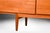 An absolutely stellar, classic Danish teak sideboard/credenza designed by Ib Kofod-Larsen, manufactured by Faarup...