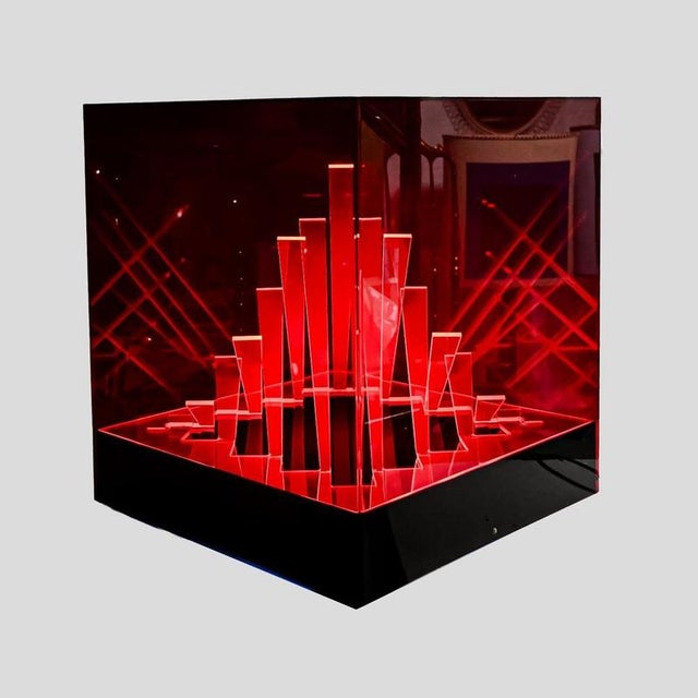 “cubo di teo” – vintage space-age red kinetic lamp by james riviere this striking space-age kinetic lamp features a bold...
