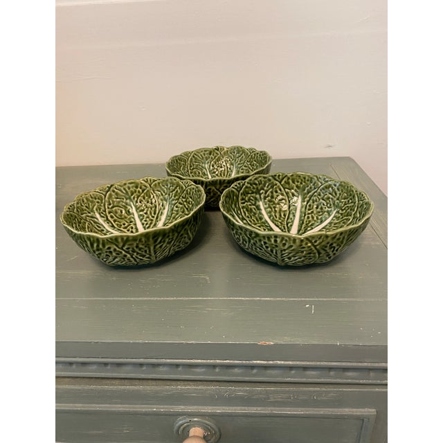 Vintage Majolica cabbage leaf bowls in good Condition. Original Condition Unaltered. Some Imperfections. One bowl has been...