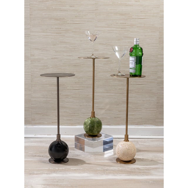 Boston is our modern martini table featuring a solid natural cream marble ball base with accents of aged brass finished...