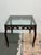 Design Plus Gallery presents a Metal Side Table from the Mid 20th Century. The table has a wrought iron frame with curved...