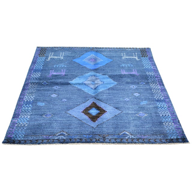 Vintage Gabbeh Hand-knotted with care using traditional rug-making techniques, this wool rug blends timeless craftsmanship...