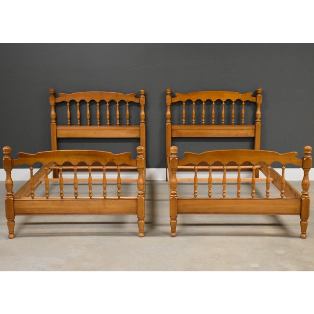 A pair of solid maple twin beds with three slats each. Made in USA. Circa 1960’s. Unmarked. Excellent vintage condition....