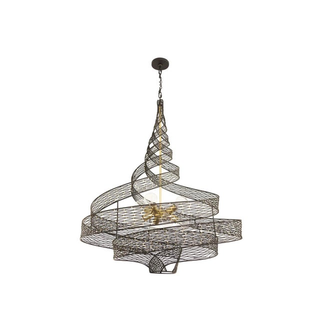 Rhythmic and organic in its movement, Flow presents a design that captivates. Hand-forged into spiraling, fluid shapes...