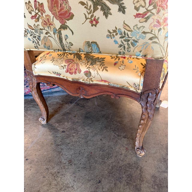 Champagne Pair of Antique French Louis XV Carved Walnut Bergère Armchairs For Sale - Image 8 of 11