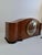 An elegant Art Deco mantel clock produced in Czechoslovakia circa 1930. Crafted from wood with a beautifully figured...