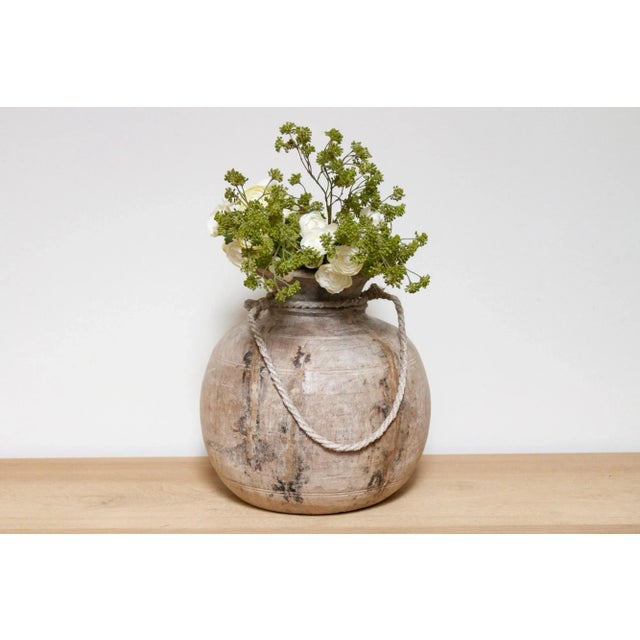 This charming antique carved wood pot was crafted from teak and originally used in Village kitchens in North India to...