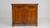 Rendered in rich golden oak, this French Louis XVI buffet exemplifies the neoclassical elegance that defined late...