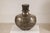 Brown Vintage Indian Hammered Metal Water Vessel with Wooden Stopper For Sale - Image 8 of 13