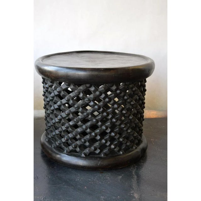 Two African Bamileke hand carved wooden tables or stools. Cameroon, early 20th century Dimensions: 17"H x 22"D